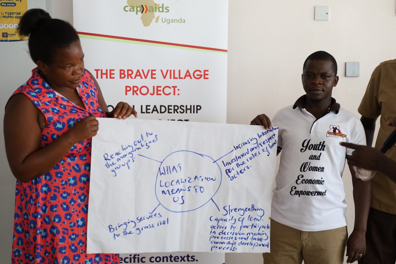 Participants reviewing co-creation findings at action planning meeting