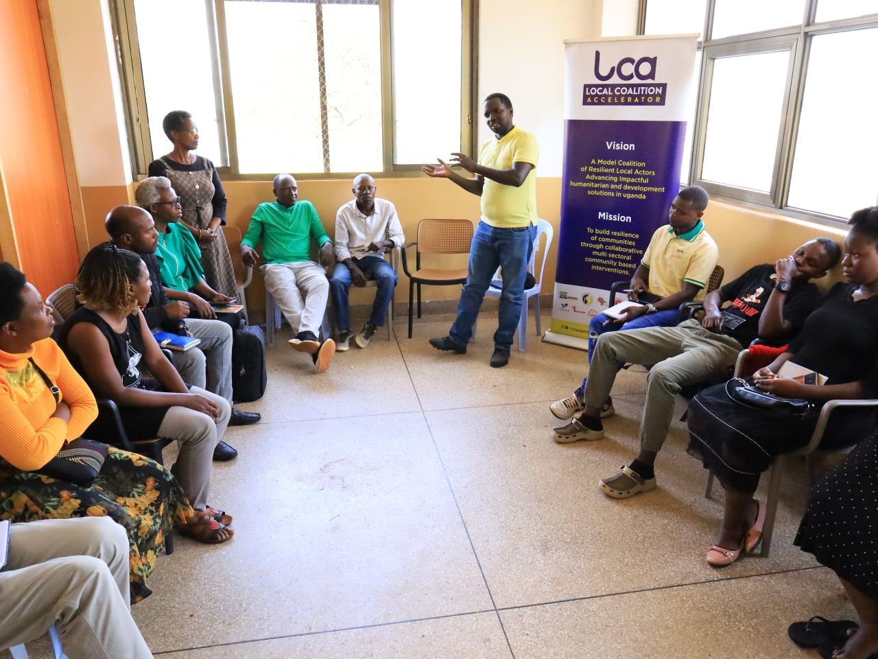 Community members engaged at the Mengo event