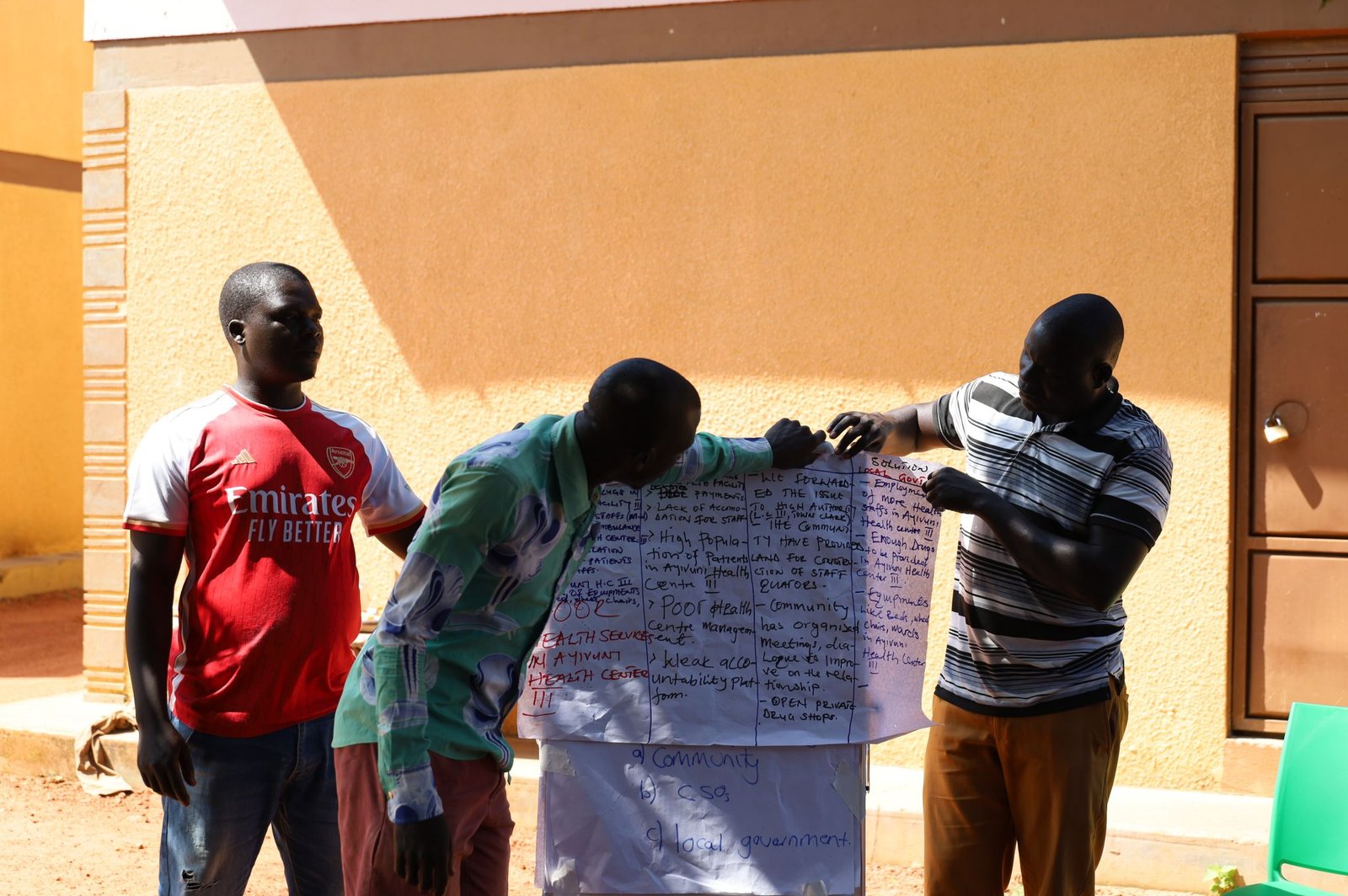 Community members contributing ideas during the dialogue